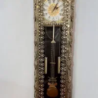 آینه کنسول و ویترین وساعت برنزایستاده