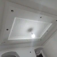 گچکاری ساختمان سفید زیرکار