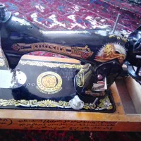 چرخ خیاطی قدیمی شیر خوابیده