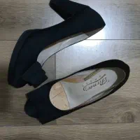 کفش مجلسی|کیف، کفش، کمربند|لاهیجان, انقلاب|دیوار