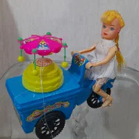 عروسک دوچرخه سوار