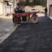 اجرای زیرسازی آسفالت عقب نشینی ساختمان