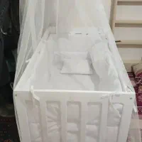 تخت نوزادی کنار مادر