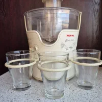 آب میوه گیری تفال همراه با آب مرکبات گیر