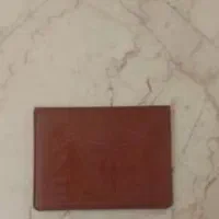 کیف مدارک قهوهای رنگ گم شده