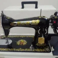 چرخ خیاطی مرد پرنده