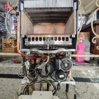 تعمیر و سرویس انواع پکیج وآبگرمکن جوشکاری آبگرمکن