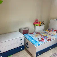 تخت و دراور کودک به همراه لوستر