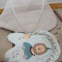 پشه بند و قنداق سویسی