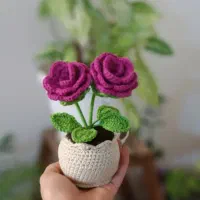 عروسک بافتنی گل بافتنی