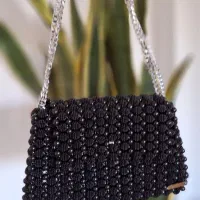 کیف مرواریدی|کیف، کفش، کمربند|رشت, امین الضرب|دیوار