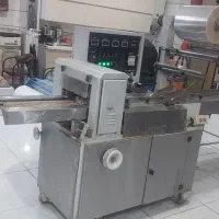 دستگاه پیلو پک مکانیکی بسته بندی کیک