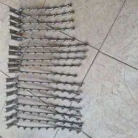 رگال آویزی برای لباس به رنگ استیل ضد زنگ