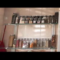 باکس شیشه ایی مخصوص چیدن شیشه های ادویه حبوبات گل