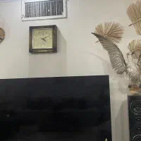 دکوری ، تزئینات، ساعت و مجسمه