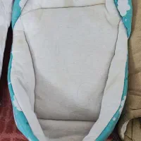 آغوش و قندان کودک