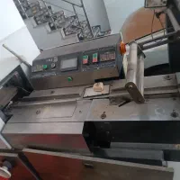 دستگاه بسته بندی پیلو پک|ماشینآلات صنعتی|قم, تعویض پلاک|دیوار