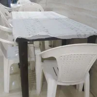 یه عدد میز وسه تا صندلی درحد نو