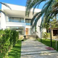 ویلا درشهرک هم تیپ جنگلی/ آسفالت شده/ وازیوار