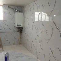 نصاب انواع برچسب کابینت‌و نصب انواع ماربل شیت