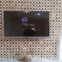 نصب آنتن هوایی و گیرنده دیجیتالی و براکت. برق کشی