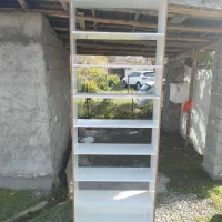 یکسری لوازم چوبی|کتابخانه، شلف، قفسه‌های دیواری|سنگر, |دیوار