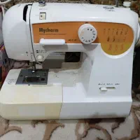 چرخ خیاطی و ابزار کاشت ناخن