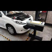 تنظیم نورچراغ خودرو با دستگاه لیزری
