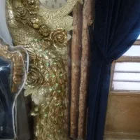 ساعت ایستاده طاووس