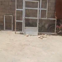 درب اهنی همراه با پنجره فروشی