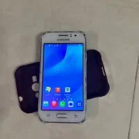 گوشی جی وان j1  * جعبه a3