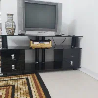 تلوزیون همراه با میز رایگان