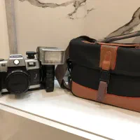 دوربین المپیا با لوازم