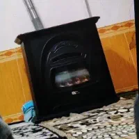 بخاری گازی طرح شومینه