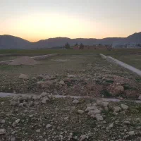 زمین ۱۱۰۰متری سنددار بامجوزگلخانه درچهارتنگ علیا