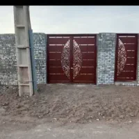 زمین چهار دیواری، در روستای خدیجه خاتون.