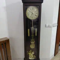 ساعت ومجسمه وتنگ