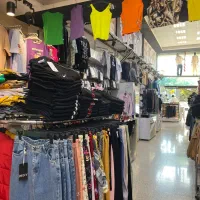 فروشنده لباس آقا و خانم