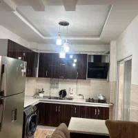 کابینت هایگلاس همراه با گازو هود و سینک