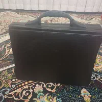 کیف|کیف، کفش، کمربند|قم, نیروگاه|دیوار