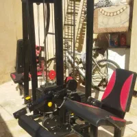 دستگاه بدنسازی جلوران پشت پا فلای و لت