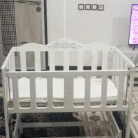 تختخواب و گهواره نوزاد