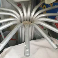 میز شیشه ای گرد با پایه استیل