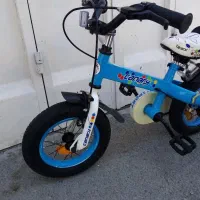 دوچرخه سایز۱۲ بچه گانه قناری ژاپن درحد صفر واقعی|دوچرخه، اسکیت، اسکوتر|اصفهان, خانه اصفهان|دیوار