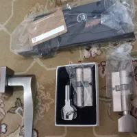 دستگیره دوتیکه به همراه قفل