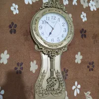 ساعت دیواری طلایی