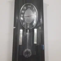 ساعت دیواری آونگ دار