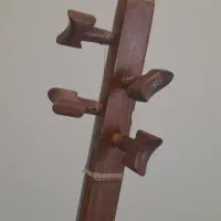 سه تار زیرعبایی|سازهای سنتی|تهران, فلسطین (میدان انقلاب)|دیوار