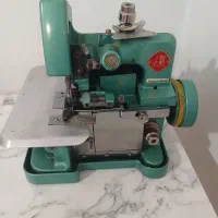 سردوز  ومیز چرخ خیاطی