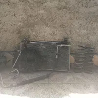 رادیاتور کولر موتور فن وفنر کمک و کپسول گاز پرایدی